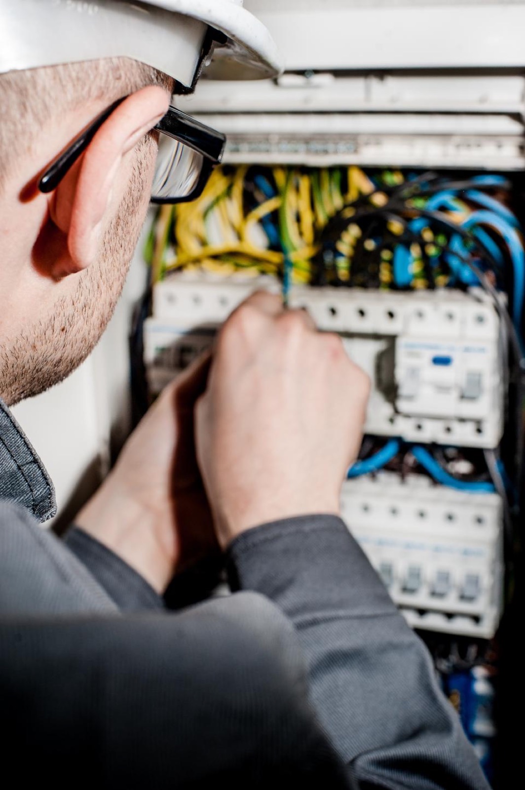 Electrician upgrading the panel in an established St. Lucie West home in Port St. Lucie